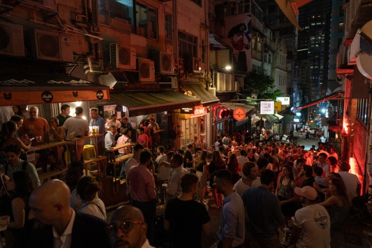 After shuttering bar districts early in the pandemic, Hong Kong reopened them in May. Some have been linked to new clusters of cases. (Roy Liu/Bloomberg via Getty Images)