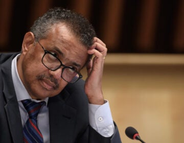 World Health Organization Director-General Tedros Adhanom Ghebreyesus at a news conference last month in Geneva. He is urging countries to join a pact aimed at ensuring access to drugs to prevent COVID-19. (Fabrice  Coffrini/Pool/AFP via Getty Images)