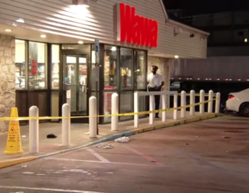 Police were seen at a Wawa on East Erie Avenue investigating a shooting early Friday. (Pete Kane/NBC10)