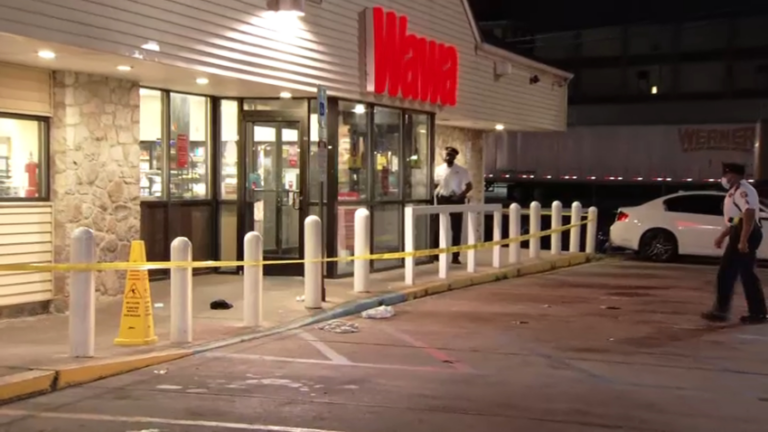 Police were seen at a Wawa on East Erie Avenue investigating a shooting early Friday. (Pete Kane/NBC10)