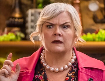 Actress Paula Bell looking confused in a screen from TV show, 