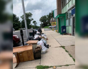 Flood damage from Tropical Storm Isaias and piles of garbage that have gone uncollected for days or weeks as Upper Darby scrambles to deal with twin crises of a weather disaster and coronavirus cluster among sanitation workers. (Photos via Chuck Nguyen)