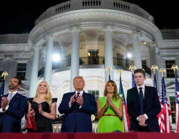 From left, Kimberly Guilfoyle, Donald Trump Jr., Tiffany Trump, President Trump, first lady Melania Trump and Barron Trump stand on the South Lawn of the White House on the last night of the Republican National Convention. (Evan Vucci/AP Photo)