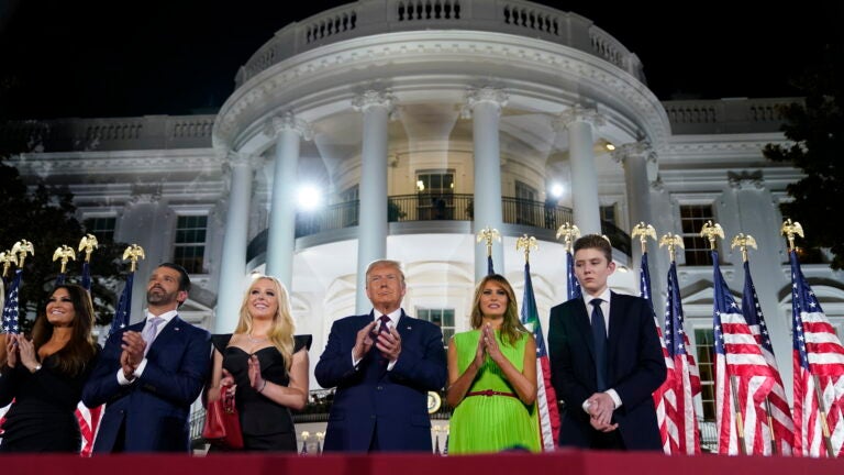 From left, Kimberly Guilfoyle, Donald Trump Jr., Tiffany Trump, President Trump, first lady Melania Trump and Barron Trump stand on the South Lawn of the White House on the last night of the Republican National Convention. (Evan Vucci/AP Photo)