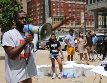 City Councilmember Isaiah Thomas speaks at an 