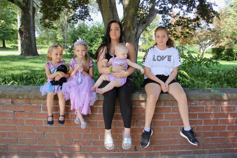 As a single mother of four, Tiffani Szabara is finding virtual school challenging for her two oldest daughters. They are (from left) Brinley, 4, first grader Cadence, 6, Emmarie, 1, and 7th grader Jaedlyn, 12. (Emma Lee/WHYY)