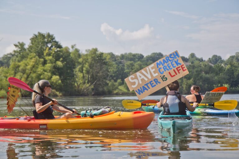 Protesters of Sunoco’s Mariner East Pipline kayaked to a clean-up site on Marsh Creek Lake in Chester County, Pa., where an estimated 8,000 gallons of drilling mud migrated into the waterways. (Kimberly Paynter / WHYY)