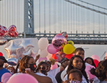 Friends and family of Avante Reynolds, a 25 year-old woman who was killed crossing the Cobbs Creek Parkway in Philadelphia, gathered on the Camden Waterfront to remember her. (Kimberly Paynter/WHYY)