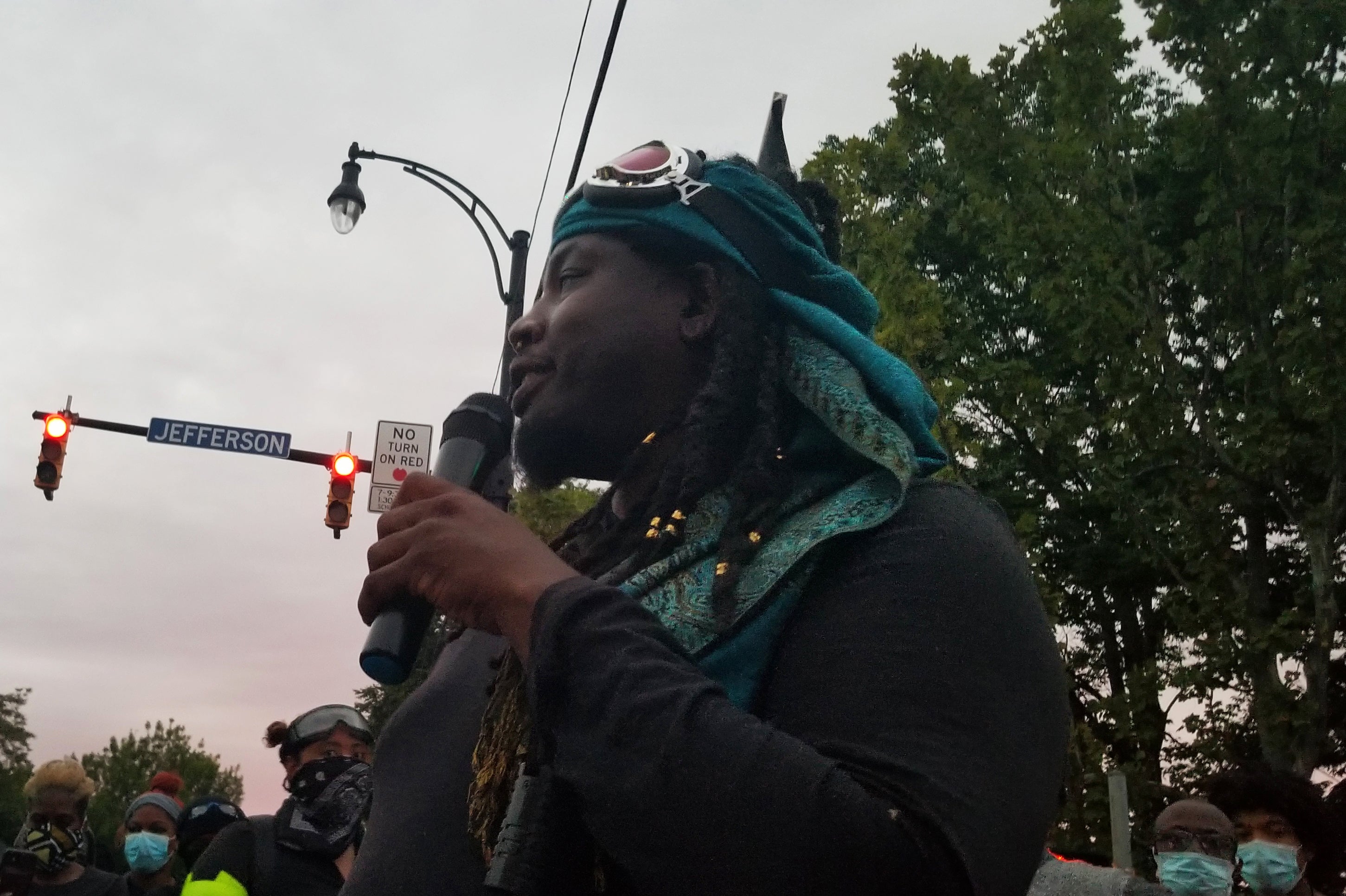 Poet and activist Christopher Coles addresses a crowd in Rochester, N.Y.