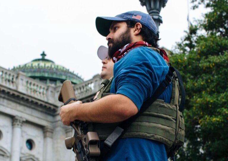 An attendee holds his weapon at the Rally to Protect Your Right to Keep and Bear Arms at the state Capitol on September 29, 2020. (Kate Landis/WITF)