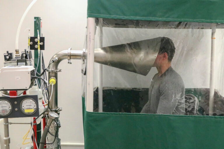 This February 2018 photo provided by the University of Maryland School of Public Health shows The Gesundheit II machine in Dr. Donald Milton's Public Health Aerobiology, Virology, and Exhaled Biomarker Laboratory at the University of Maryland School of Public Health in College Park, Md. (University of Maryland School of Public Health via AP)