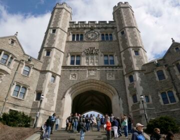 In this April 5, 2018, file photo, people walk through the Princeton University campus in Princeton, N.J. (AP Photo/Seth Wenig)