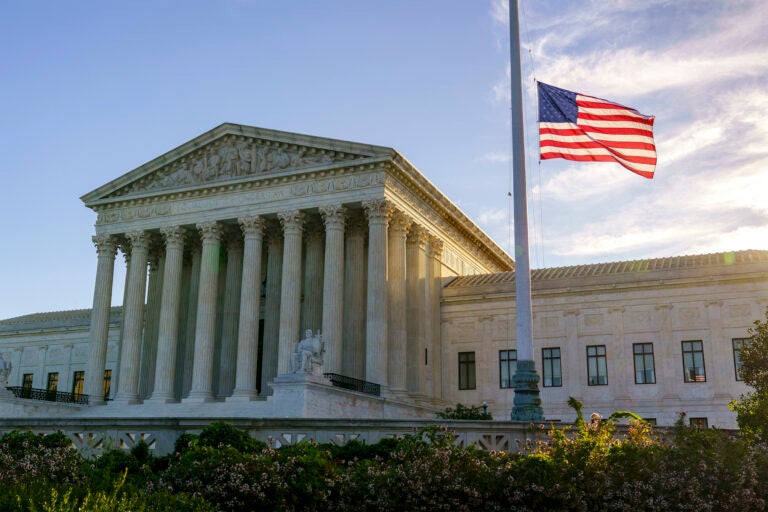 The flag flies at half-staff at the Supreme Court on the morning after the death of Justice Ruth Bader Ginsburg, 87, Saturday, Sept. 19, 2020 in Washington. (AP Photo/J. Scott Applewhite)