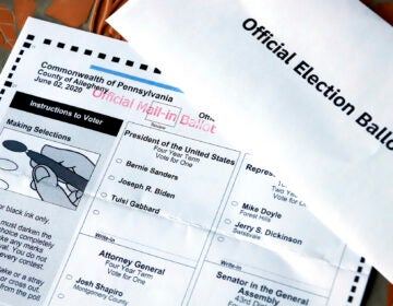 This May 26, 2020, file photo shows an Official Democratic General Primary mail-in ballot and secrecy envelope, for the Pennsylvania primary in Pittsburgh. (AP Photo/Gene J. Puskar)