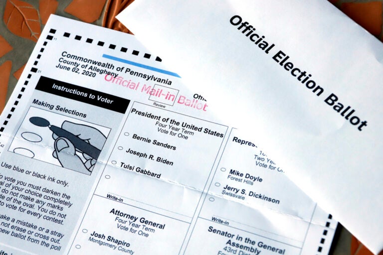 This May 26, 2020, file photo shows an Official Democratic General Primary mail-in ballot and secrecy envelope, for the Pennsylvania primary in Pittsburgh. (AP Photo/Gene J. Puskar)