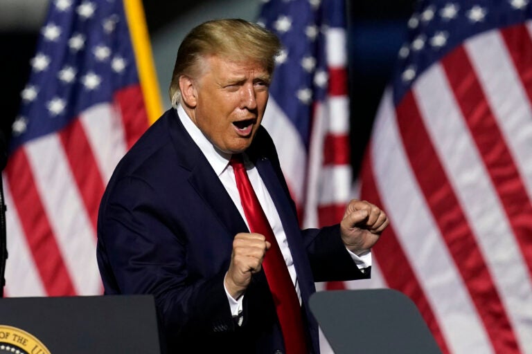 President Donald Trump does a little dance after speaking at a campaign rally Friday, Sept. 25, 2020, in Newport News, Va. (AP Photo/Steve Helber)