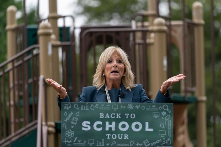 Jill Biden, wife of Democratic presidential candidate former Vice President Joe Biden, speaks in front of a closed playground during a tour of the Evan G. Shortlidge Academy in Wilmington, Del., Tuesday, Sept. 1, 2020, to launch a multi-week swing through 10 battleground states. (AP Photo/Carolyn Kaster)