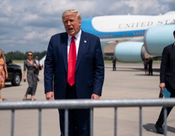 President Donald Trump talks to a crowd of supporters after arriving at Wilmington International Airport, Wednesday, Sept. 2, 2020, in Wilmington, N.C. (AP Photo/Evan Vucci)