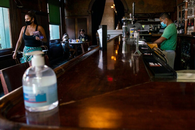 People have lunch inside a local restaurant on Friday, Sept. 4, 2020, in Hoboken, New Jersey. (AP Photo/Eduardo Munoz Alvarez)