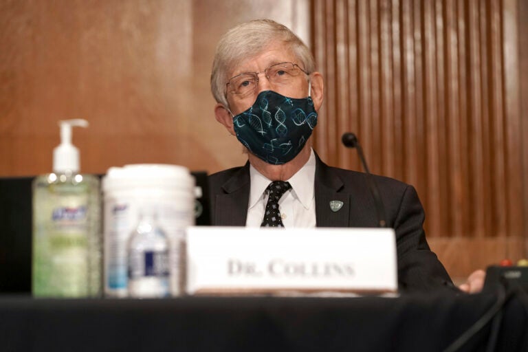 Dr. Francis Collins, Director of the National Institutes of Health, attends a Senate Health, Education, Labor and Pensions Committee hearing to discuss vaccines and protecting public health during the coronavirus pandemic on Capitol Hill, Wednesday, Sept. 9, 2020, in Washington. (Greg Nash/Pool via AP)