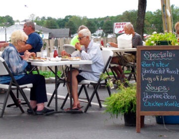 Customers eat in the outdoor dining area of the Rainbow Diner in Brick, N.J.