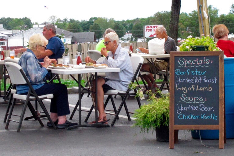 Customers eat in the outdoor dining area of the Rainbow Diner in Brick, N.J.