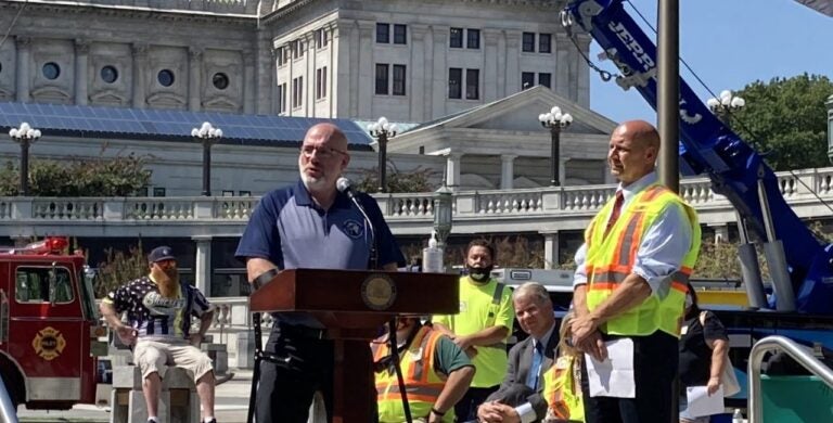 Former Pa. State Police Sgt. Bob Bemis speaks at a rally supporting increased penalties for those who fail to comply with the state's Steer Clear law. At right, state Sen. Doug Mastriano (R, Adams County) (Sam Dunklau/WITF)
