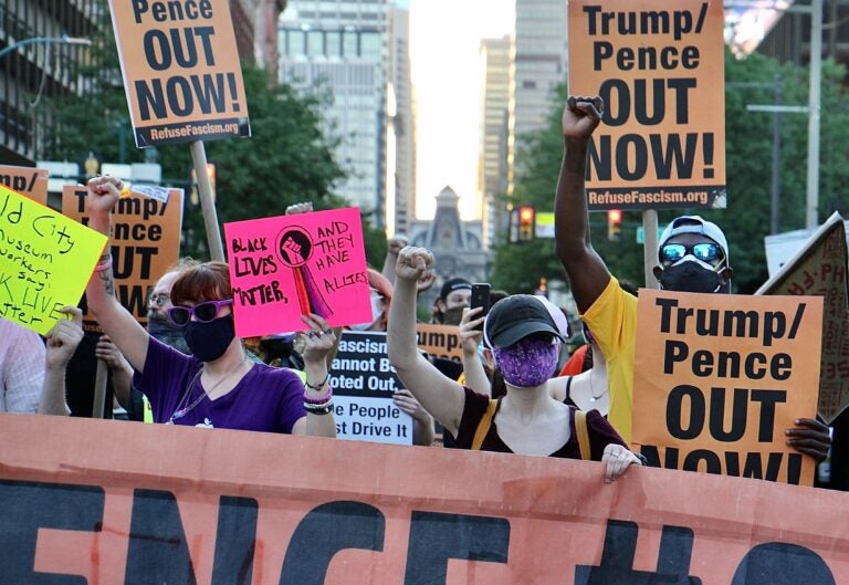 Anti-Trump protesters take to the streets after a rally at Independence Mall. (Emma Lee/WHYY)