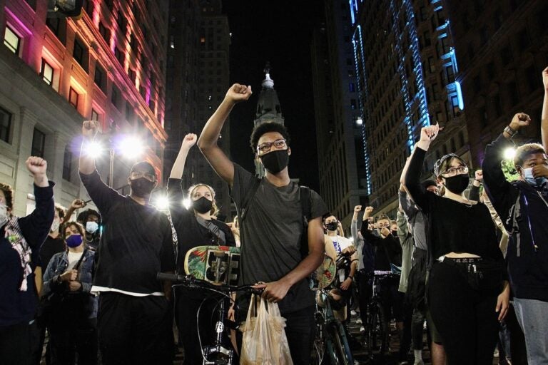 Protesters march south on Broad Street. About 200 participated in the action after a grand jury in Louisville, Ky., failed to bring charges against the police officers who killed Breonna Taylor. (Emma Lee/WHYY)