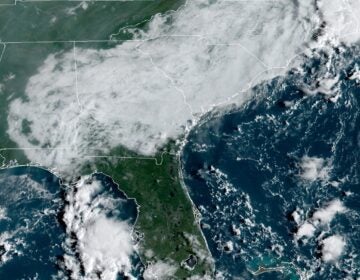 A geocolor image shows the view from a NOAA satellite over the East Coast.