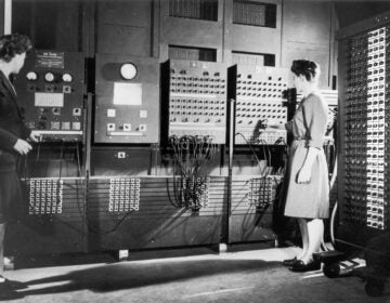 Two women operating the ENIAC's main control panel while the machine was still located at the Moore School. Left: Betty Jennings (Mrs. Bartik) Right: Frances Bilas (Mrs. Spence) setting up the ENIAC. (United States Army/Public domain)