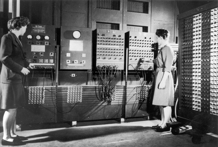 Two women operating the ENIAC's main control panel while the machine was still located at the Moore School. Left: Betty Jennings (Mrs. Bartik) Right: Frances Bilas (Mrs. Spence) setting up the ENIAC. (United States Army/Public domain)