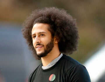 Free agent quarterback Colin Kaepernick will appear in the latest update of the Madden NFL 21 franchise. Kaepernick is seen above ahead of a workout for NFL football scouts and media in Riverdale, Ga. in 2019. (Todd Kirkland/AP)