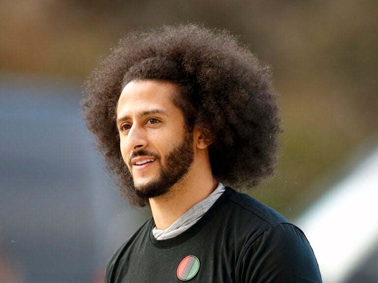 Free agent quarterback Colin Kaepernick will appear in the latest update of the Madden NFL 21 franchise. Kaepernick is seen above ahead of a workout for NFL football scouts and media in Riverdale, Ga. in 2019. (Todd Kirkland/AP)