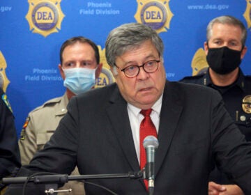 U.S. Attorney General William Barr, seen here in Phoenix on Sept. 10, called his colleagues at the Justice Department a 
