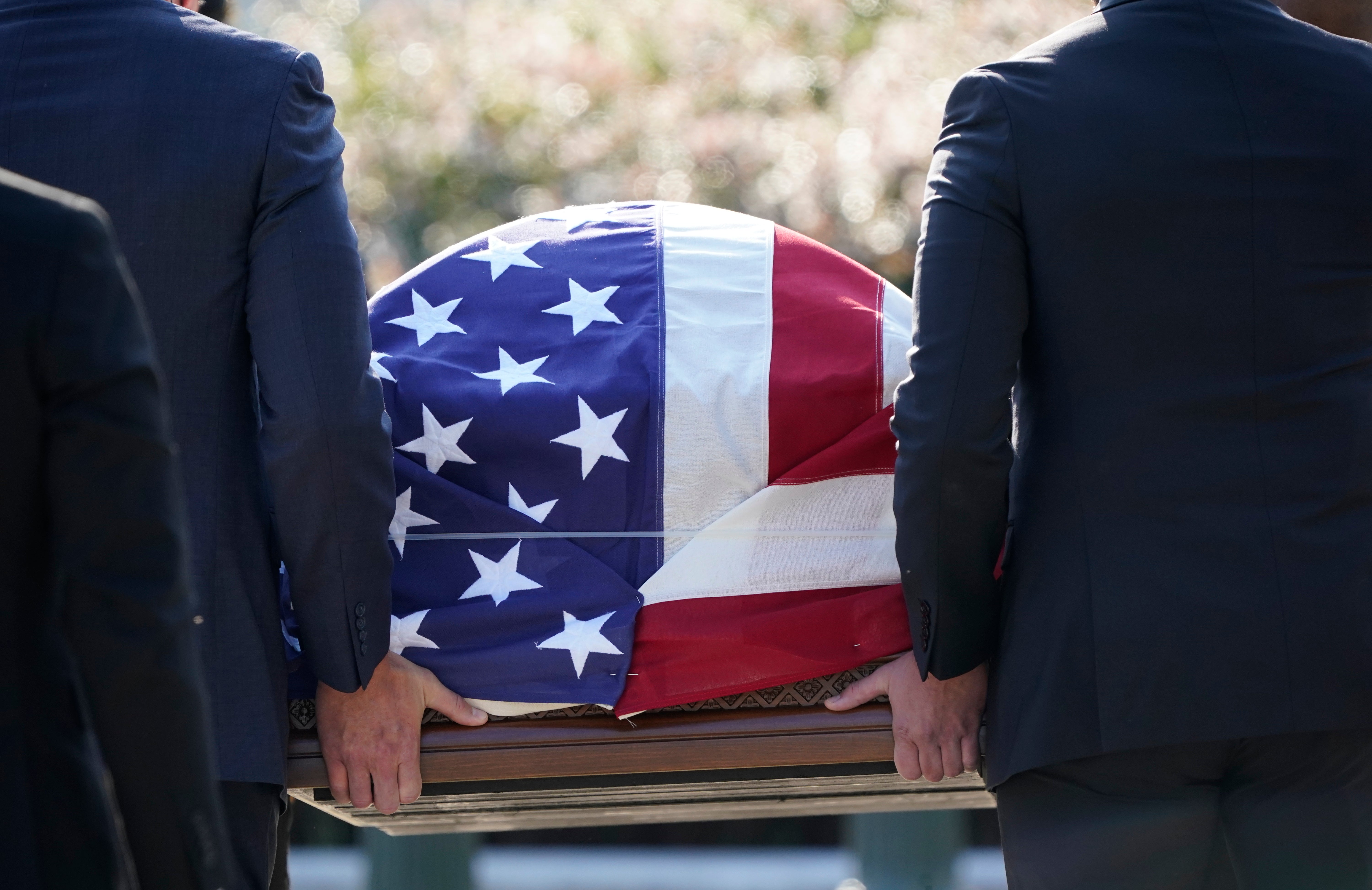 The flag-draped casket of Justice Ruth Bader Ginsburg