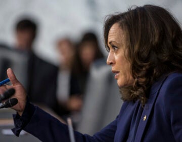 Sen. Kamala Harris, D-Calif., questions Supreme Court nominee Brett Kavanaugh during his 2018 confirmation hearing on Capitol Hill. That took place in the run-up to her presidential bid. Now, she'll face the spotlight as her party's vice presidential nominee. (Zach Gibson/Getty Images)