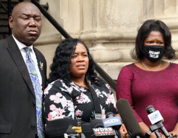 Breonna Taylor's mother, Tamika Palmer, says the justice system failed her daughter, an emergency room technician who was shot and killed by police in her own apartment in March. Palmer released a statement through her sister Friday, after a grand jury declined to level any charges directly related to Taylor's death. Palmer is seen here in August, speaking outside Louisville City Hall. (John Sommers II/Getty Images)
