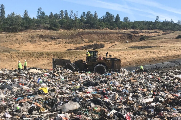 Landfill workers bury all plastic except soda bottles and milk jugs at Rogue Disposal & Recycling in southern Oregon. (Laura Sullivan/NPR)