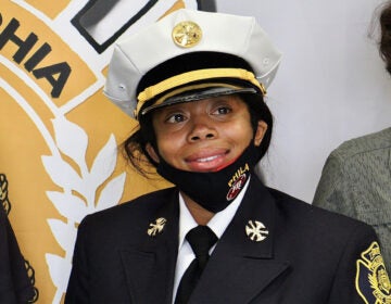 The Philadelphia Fire Department's first Black woman Battalion Chief Lisa Forrest, after her swearing in ceremony. (Emma Lee/WHYY)
