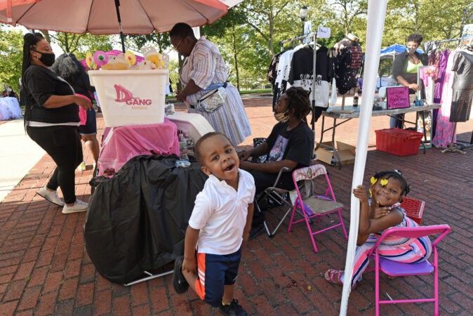 Shamyr Johnson, Michael Winbush and Zehira Johnson at Masked Melanin Market