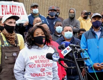 Lisa Forrest, Philadelphia's Fire Department Battalion Chief, joins other members of the firefighters and paramedics union in denouncing the local's endorsement of Donald Trump and calling for a retraction. (Emma Lee/WHYY)