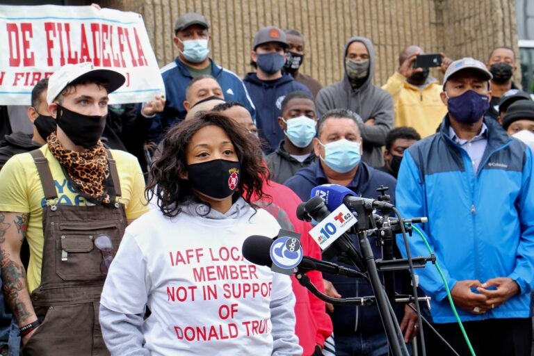 Lisa Forrest, Philadelphia's Fire Department Battalion Chief, joins other members of the firefighters and paramedics union in denouncing the local's endorsement of Donald Trump and calling for a retraction. (Emma Lee/WHYY)
