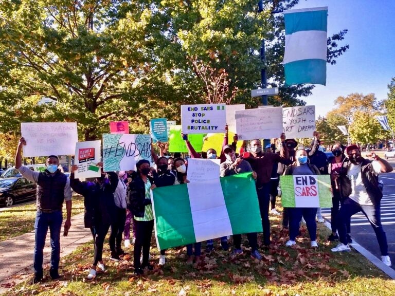 Philly Nigerian Professionals held a solidarity protest on Benjamin Franklin Parkway in Philadelphia on Oct. 17, 2020, to draw attention to ongoing extrajudicial killings in Nigeria. (Courtesy of Chioma Azi)