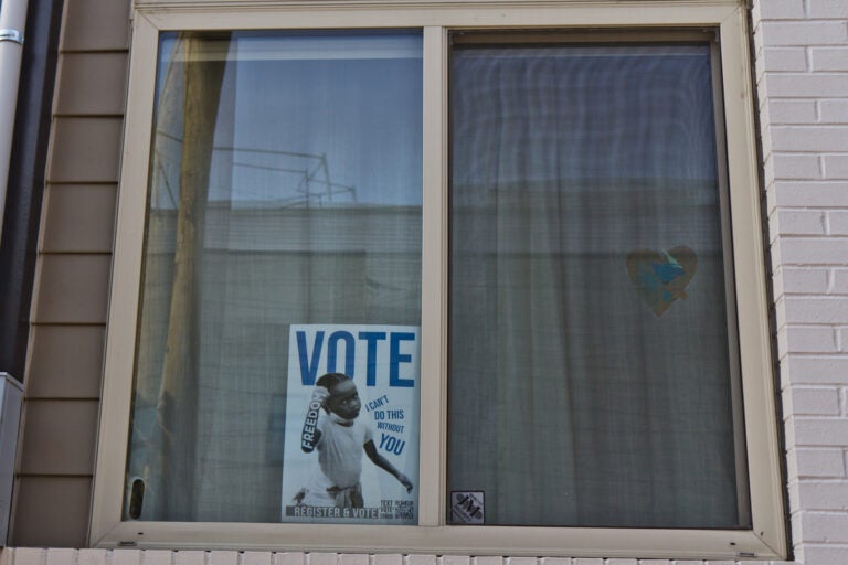 A vote poster in a East Kensington window