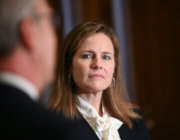 Judge Amy Coney Barrett, U.S. President Donald Trump's nominee to the Supreme Court, meets with U.S. Senator Kevin Cramer (R-ND) on Capitol Hill in Washington, U.S., October 1, 2020. (Erin Scott/Pool via AP)