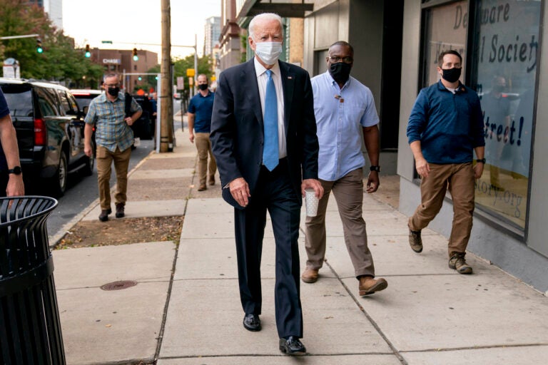 Democratic presidential candidate former Vice President Joe Biden stops to speak to members of the media as he walks out of the Queen Theater in Wilmington, Del., Thursday, Oct. 1, 2020, after pre-taping his speech for the Al Smith dinner. (AP Photo/Andrew Harnik)