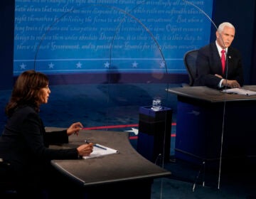 Democratic vice presidential candidate Sen. Kamala Harris, D-Calif., and Vice President Mike Pence answer questions during the vice presidential debate Wednesday, Oct. 7, 2020, at Kingsbury Hall on the campus of the University of Utah in Salt Lake City. (AP Photo/Morry Gash, Pool)
