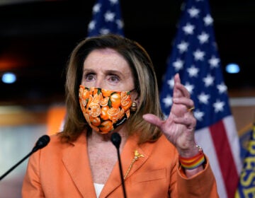 Nancy Pelosi wearing a face mask