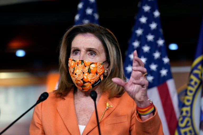 Nancy Pelosi wearing a face mask